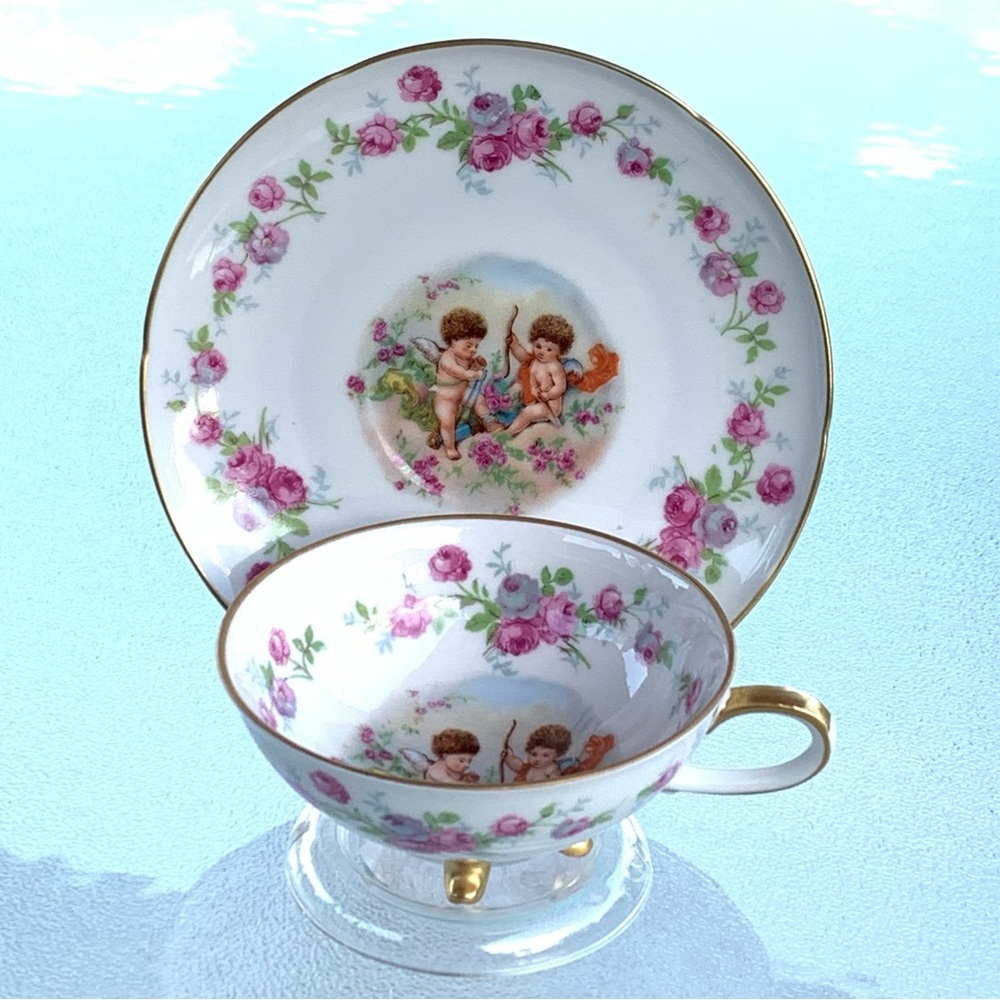 Royal Hanover Cherubs Pink and Purple Floral Gold Rimmed Teacup and Saucer